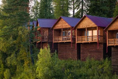Cozy cabins in the forest Stock Photos