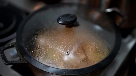 In a cozy cafe, a close-up shows elegant plates and fresh ingredients used to Stock Footage 277154940