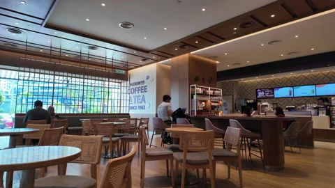 Cozy Cafe Interior at The Coffee Bean &amp; Tea Leaf in Penang Stock Footage 289101100