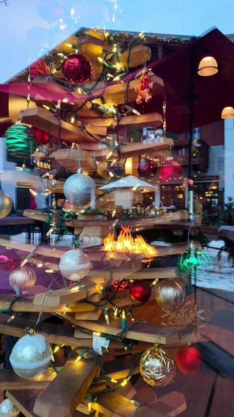 A cozy cafe window with festive decorations. Stock Footage 338315238