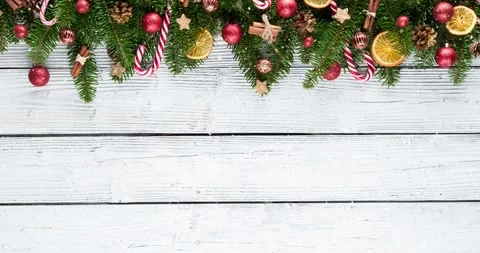 Cozy Christmas decorations arranged on rustic wood. Stock Footage 321694743