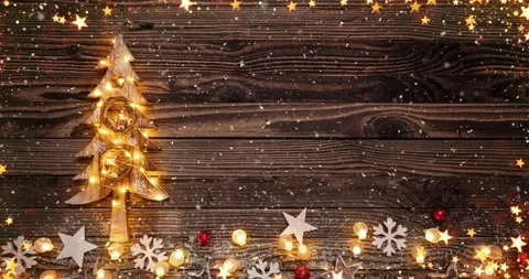 Cozy Christmas decorations arranged on rustic wood. Stock Footage 321694790