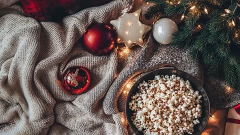 Cozy Christmas Setting with Popcorn and Holiday Decor by the Tree Stock Footage 294509132