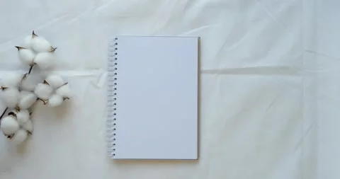 Cozy composition with a clean opened note, cup of coffee, pen Stock Footage 226944958
