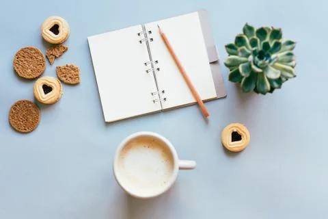 Cozy composition with a cup of coffee and cookies Stock Photos