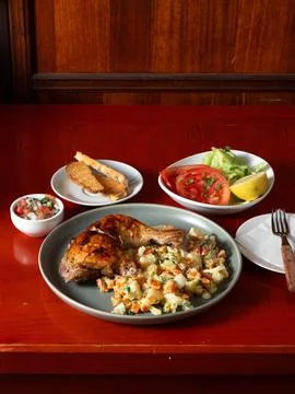 Cozy dining table holds warm meal Foto stock