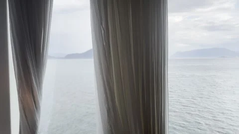 Cozy Ferry Interior with Curtains and Scenic Fjord View Through Window Stock Footage 340108776