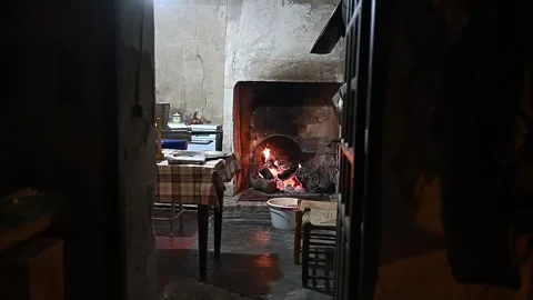 Cozy fire burning in a rustic fireplace at night Stock-Footage 320407473