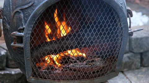 Cozy fire in the Chiminea Stock Footage 137343034