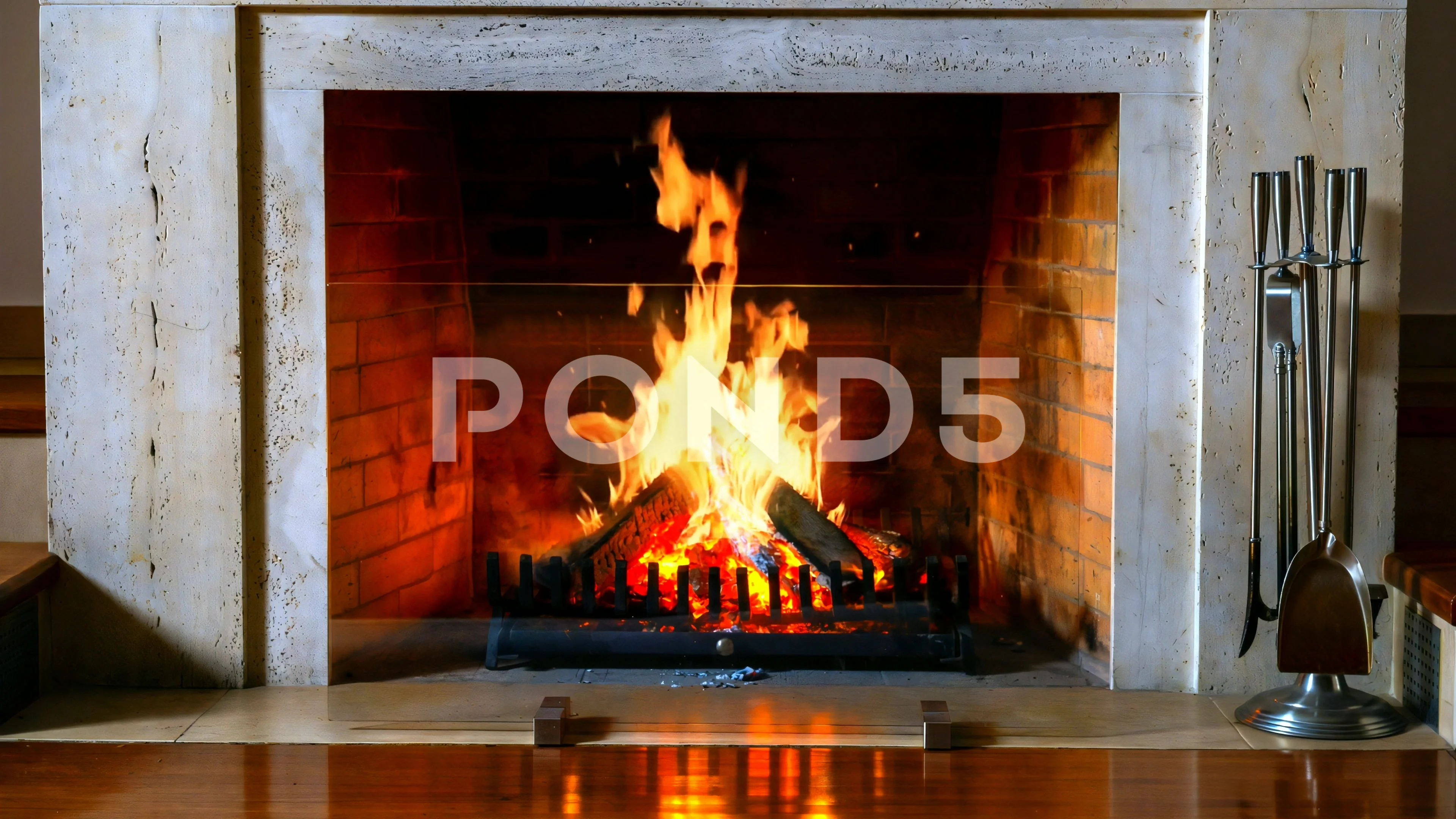 Christmas time, cozy fireplace. Wood logs burning, fire bricks