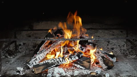 Cozy fireplace on a cold night. Warming blaze on a winter evening. Stock Footage 293092651