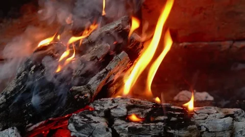 Cozy Fireplace Fire Burning, Glowing Embers and Flames in Stone Fireplace Macro Video stock 342120490