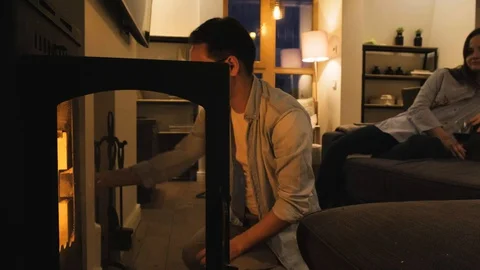 Cozy By The Fireplace At Home Stock Footage 130009630
