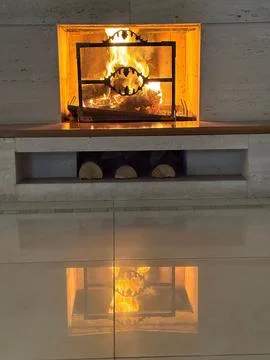 Cozy Fireplace with Reflection Stock Photos