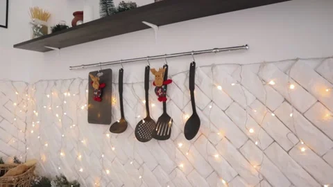 Cozy flat kitchen room green Christmas Tree gifts presents garlands Video stock 207197576