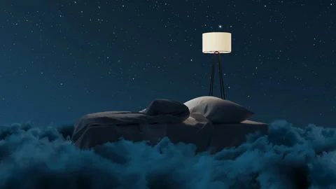 Cozy Flying Bed over Fluffy Clouds Illuminated by Lamp Stock Footage 343359614
