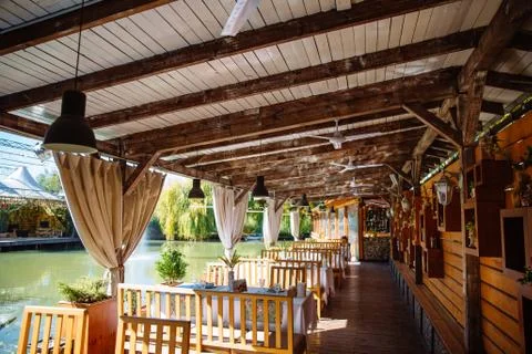 The cozy interior of the restaurant. Stock Photos