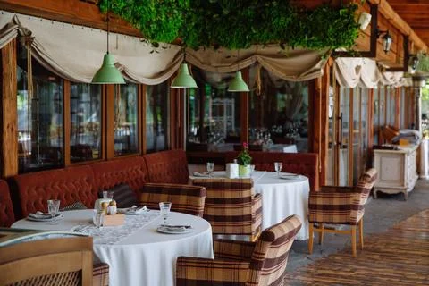 The cozy interior of the restaurant. Stock Photos