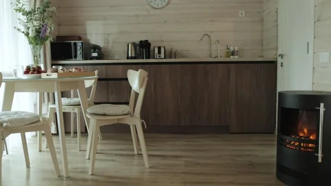 Cozy kitchen with healthy breakfast, buns with jam beautifully served on wooden Vídeos de archivo 259624061