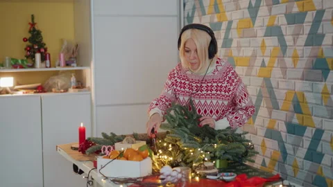 Cozy kitchen setting with Christmas embellishments. Seasonal scene featuring Stock Footage 338287822