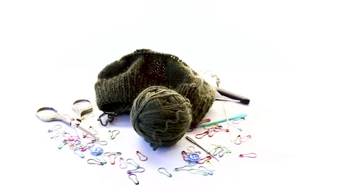 Cozy knitting hobby with yarn needles and colorful clips Stock Footage 334129031
