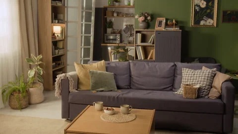 Cozy Living Room Interior Featuring Sofa and Coffee Table Stock Footage 336939731