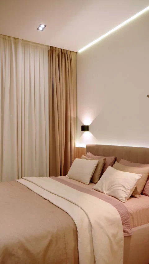Cozy Modern Bedroom with Layered Bedding and Curtains Stock Footage 342861454