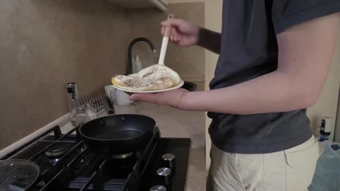 Cozy morning fried eggs making Stockbeeldmateriaal 336438258