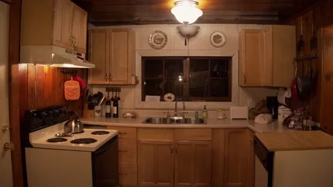 Cozy Old Cabin Kitchen At Night - Straight On Angle Stock Footage 154383863
