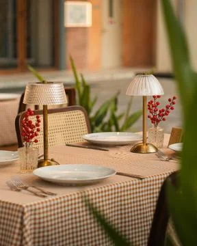 Cozy Outdoor Dining Table Set for Two at Golden Hour Stock Photos