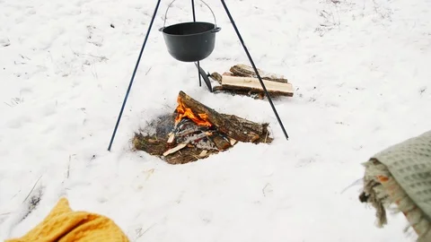 A cozy place by the fire in the winter forest. Couches by the fire. Concept cozy Vídeos de archivo 99837809