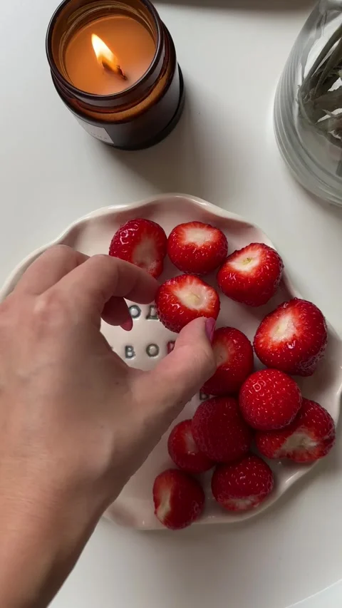 Cozy plate with strawberries Stock Footage 312999673