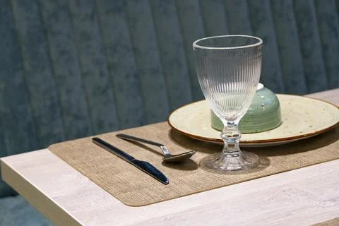 Cozy restaurant interior with table setting Stock-Fotos