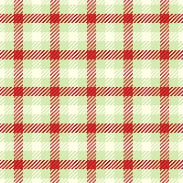 Cozy seamless plaid pattern with vibrant red, soft green, and cream hues. Per Stock Illustration