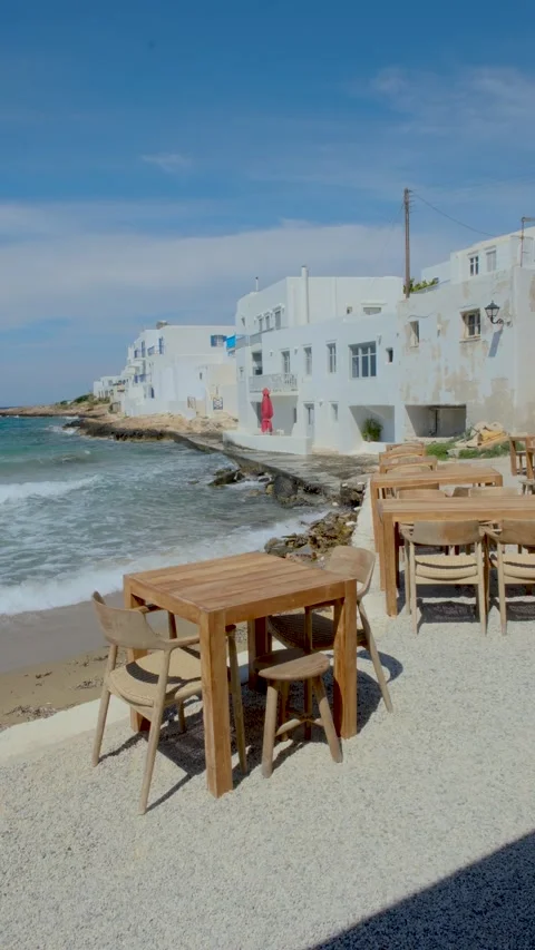Cozy seaside cafe with stunning views in Paros, Greece during sunny summer days Stock Footage 337371703