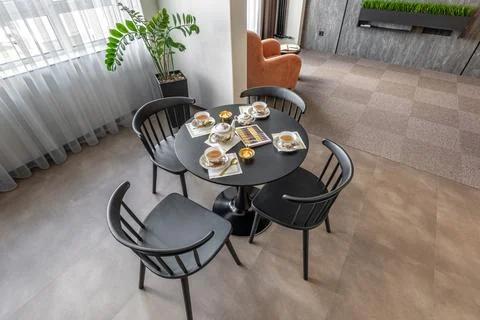 Cozy Tea Table Setup in Modern Apartment Interior Stock Photos