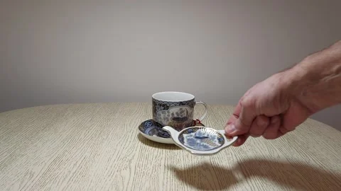 Cozy Tea Time: Mug Spoon Relaxation 스톡 동영상 303975428