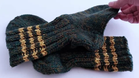 Cozy Thick Green Socks: Warm Comfort in Focus Stock Footage 308705228