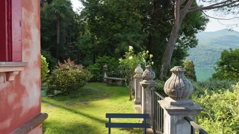 Cozy villa terrace inside Parco Scherrer in Morcote near Lake Lugano Stock Footage 341750488