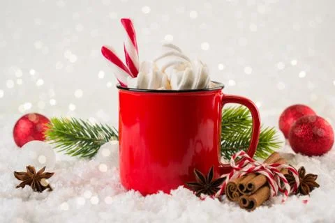 Cozy winter composition with a red cup of hot chocolate with marshmallows Stock Photos