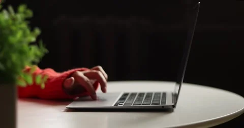 Cozy work from home scene with steaming mug and laptop on a round table Stock Footage 339072396