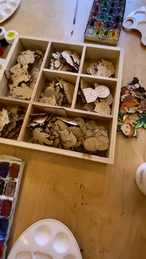 Cozy workshop with purple sofa and wooden table. Video stock 153474635