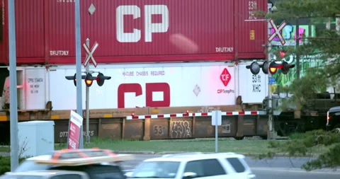 A CP intermodal train, captured in motion, showcases the vital role of rail 스톡 동영상 310061358
