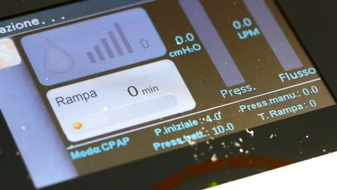 Cpap machine apnoea working display closeup Stock Footage 95254623