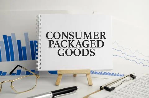 CPG - Consumer Packaged Goods text written on notepad and office supplies Stock Photos