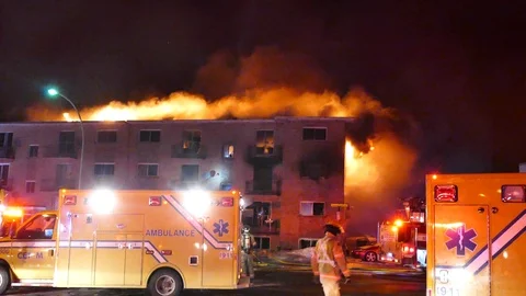 CPR during dramatic structure fire Stock Footage 105276288