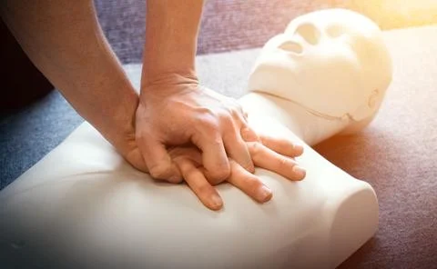 CPR first aid training demonstration - emergency resuscitation Photos
