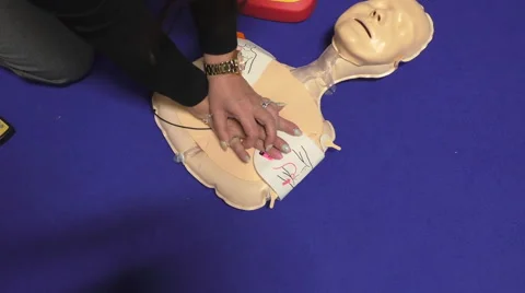 CPR performed on manikin Stock Footage 59951101