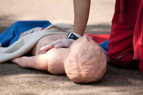 Cpr practice on dummy Stock Photos