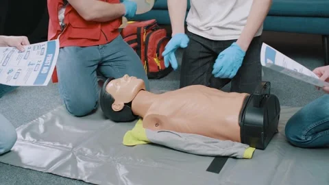 CPR training and First Aid Instruction. First Aid Cardiopulmonary Resuscitation Stock Footage 243179220